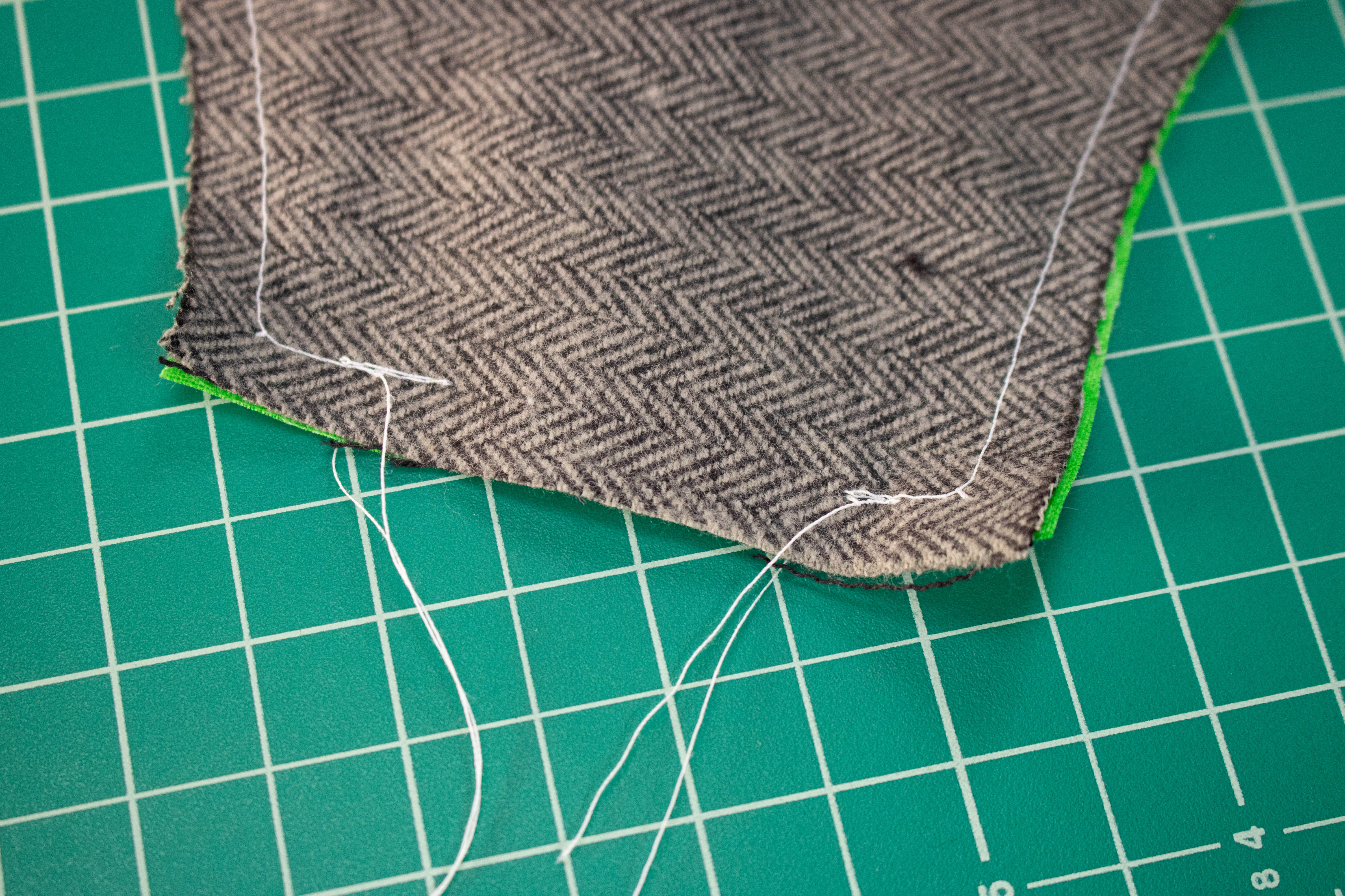 Pin the layers together and sew around the outer edge of the mask